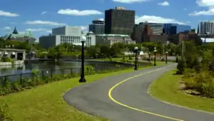 Scenic view of Ottawa skyline with pathway along the river.